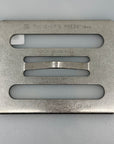 The Chef’s Press 18 oz stainless cooking press on kitchen counter