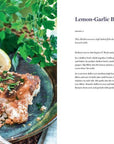 Lemon-Garlic Baked Cod dish with garnishes on a plate, next to text on a recipe.