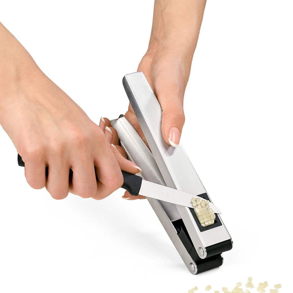
                  
                    Garlic cutter & press DUO • Triangle
                  
                