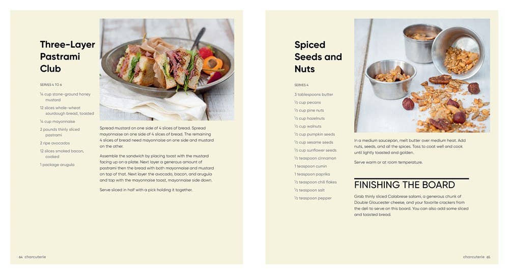 Open cookbook showing a page with a pastrami club and another with spiced seeds and nuts.