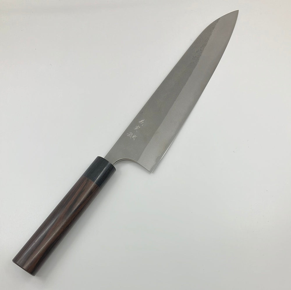 
                  
                    Yoshimi Kato Blue #2 AS Nashiji San Mai Stainless Cladding 240mm Gyuto Rosewood Handle
                  
                