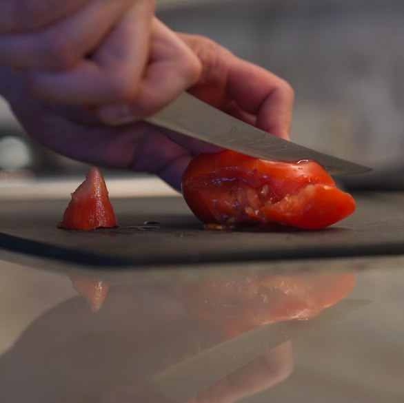 dull knife squishing a tomato 