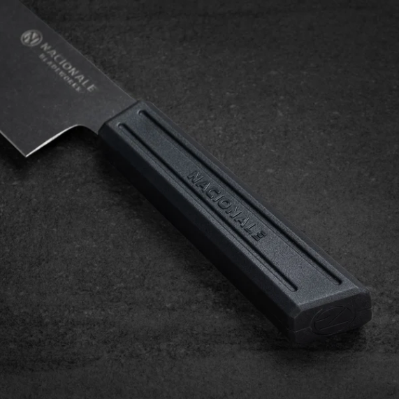 Black knife with 'NATIONALE' branding on a dark background