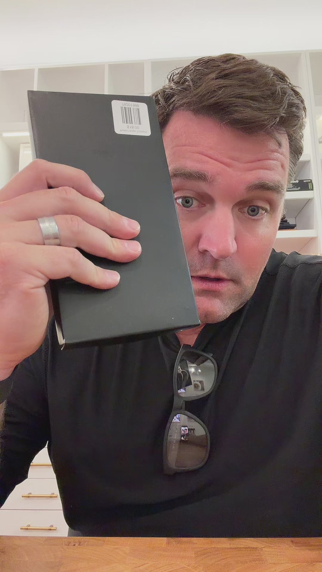 joseph rueter holding a notebook